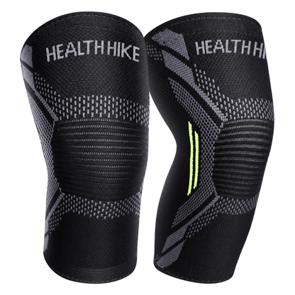 Pair of HealthHike Black Knee Compression Sleeves with grey patterns and textured knee panels, shown from the front.